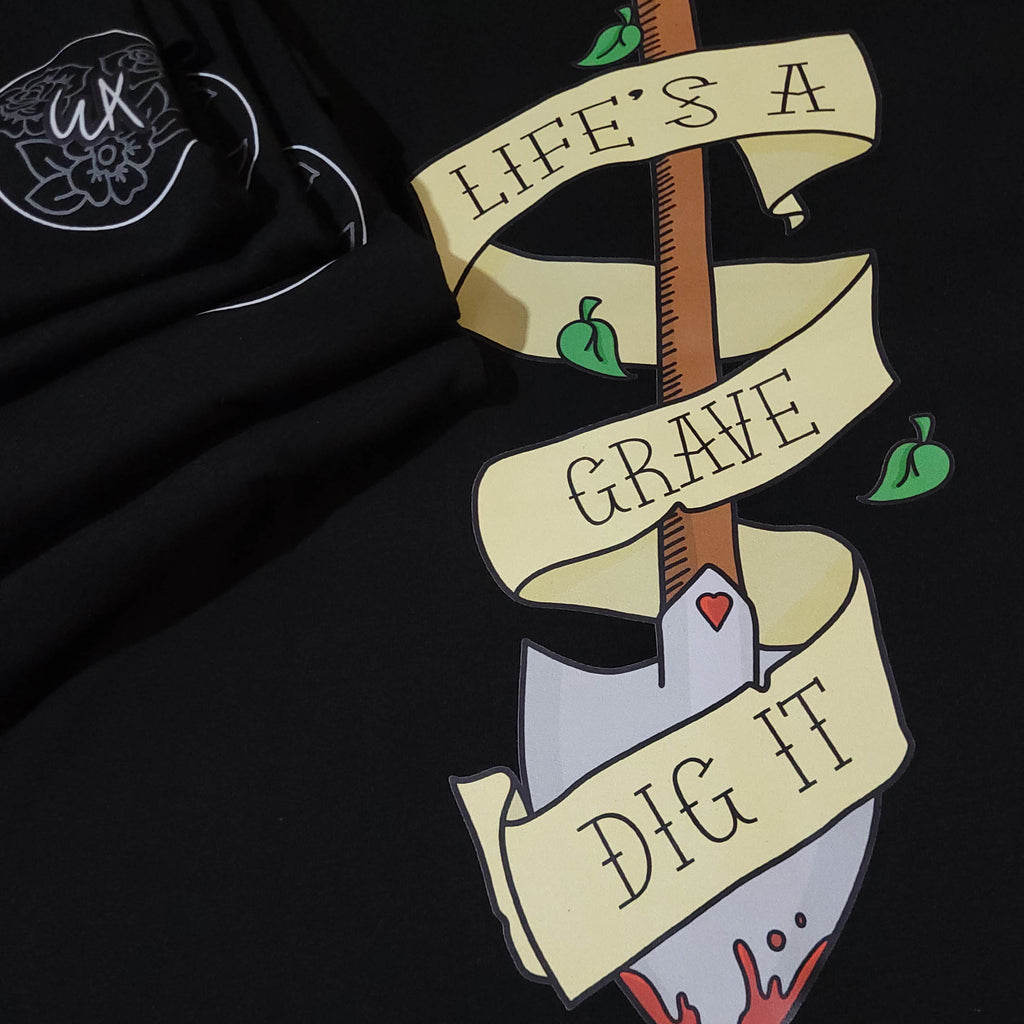 Life's A Grave Graphic Tee